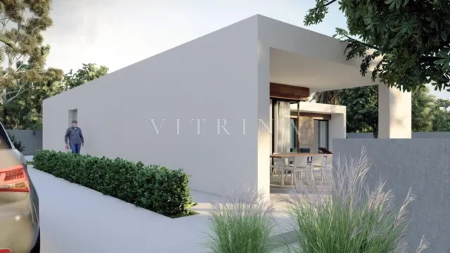 Casa en L en Colinas de San Antonio